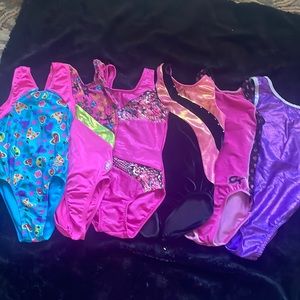 Lot of leotards!!! Mix of CS and CM. Mostly GK brand. Excellent condition